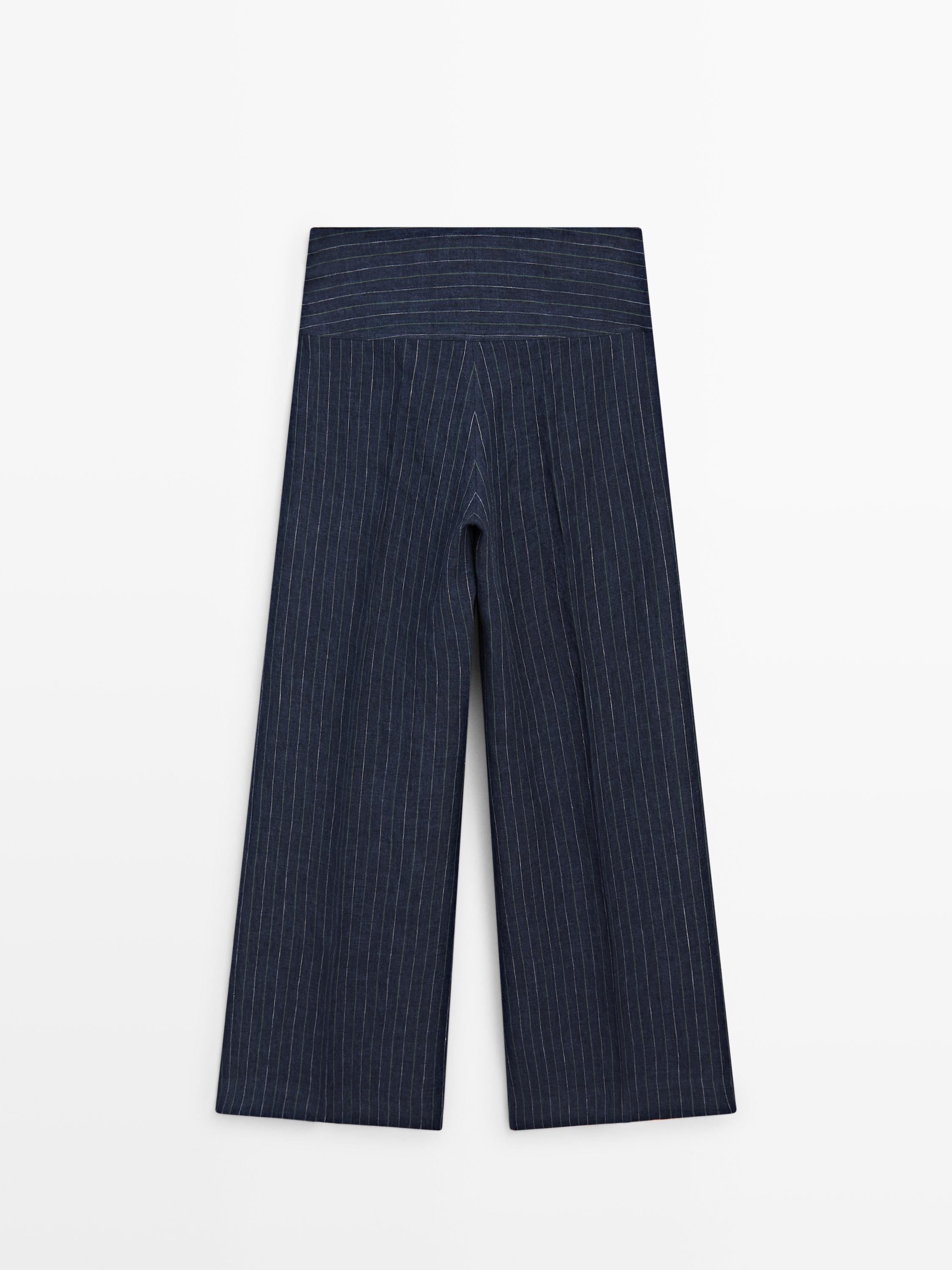 Flare fit linen trousers with striped details